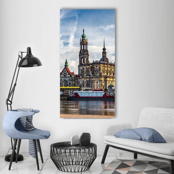 Augustus Bridge and Dresden Cathedral Vertical Canvas Wall Art in gray, brown and blue, single vertical panel hung on a wall