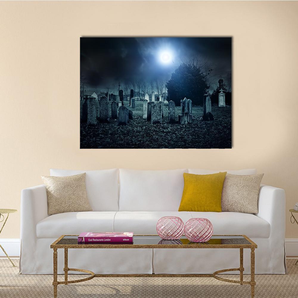 Moonlit Graveyard Canvas Wall Art in black and blue, single panel hung on a wall