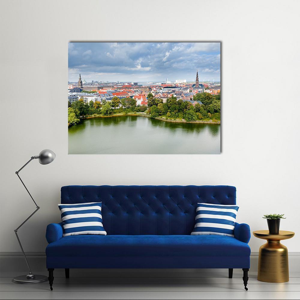 Copenhagen Cityscape with Lakeside Reflections Canvas Wall Art in gray, green and blue, single panel hung on a wall