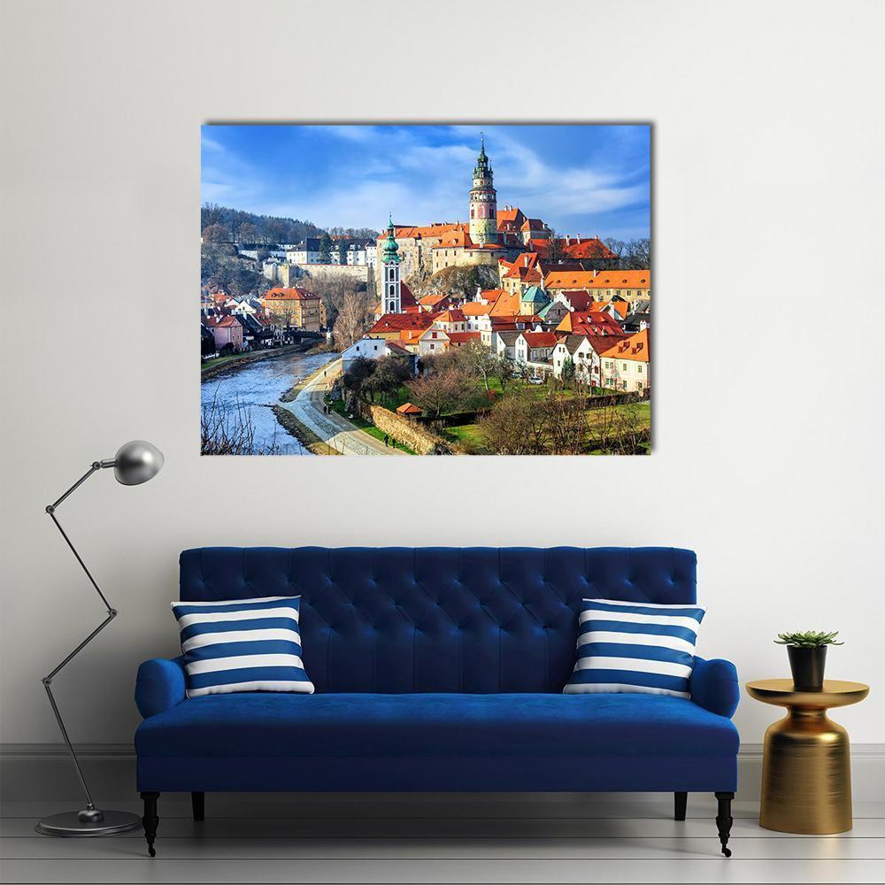 Cesky Krumlov Castle and River Canvas Wall Art in red, orange and blue, single panel hung on a wall