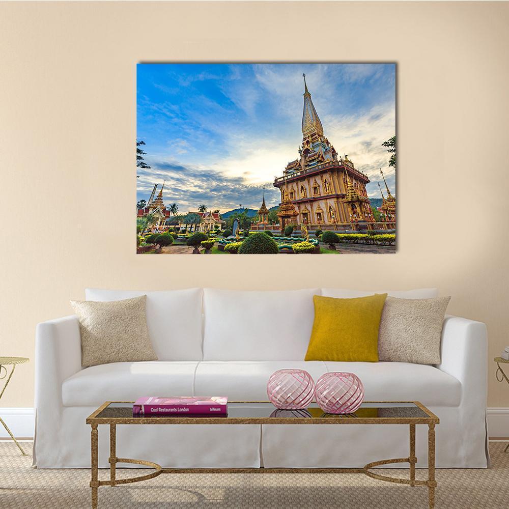 Chalong Temple with Golden Spire Canvas Wall Art in gold, yellow and blue, single panel hung on a wall