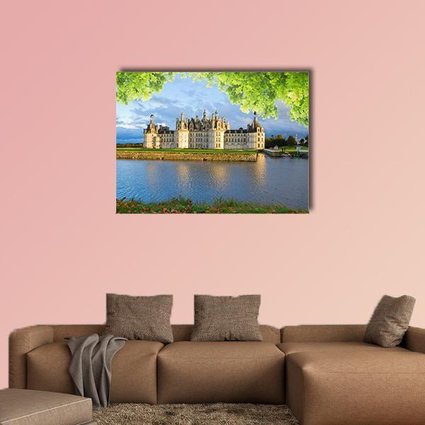 Chambord Castle, France Canvas Wall Art in white, green and blue, single panel hung on a wall