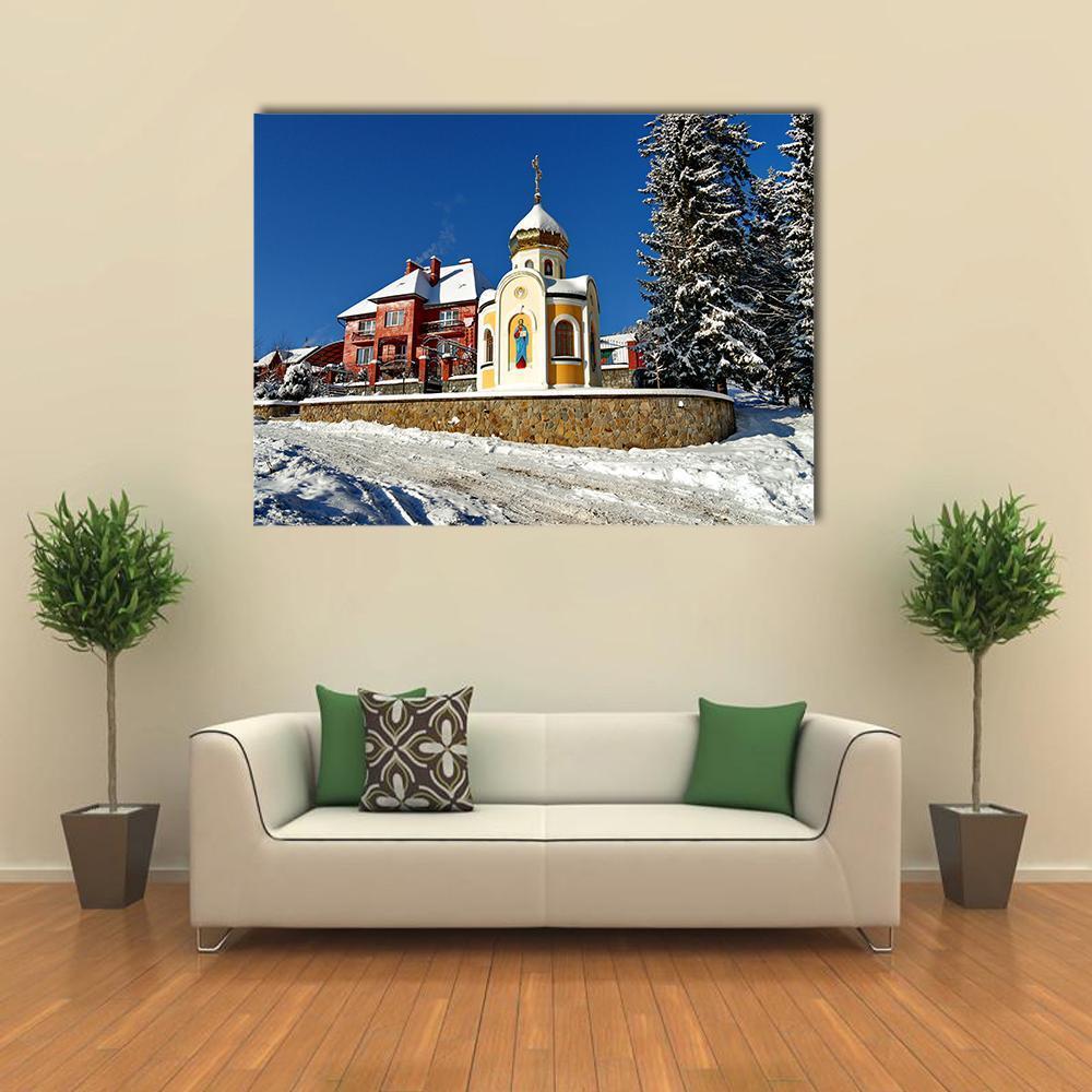 Chapel with Saint Face and Golden Dome Canvas Wall Art in white, gold and blue, single panel hung on a wall