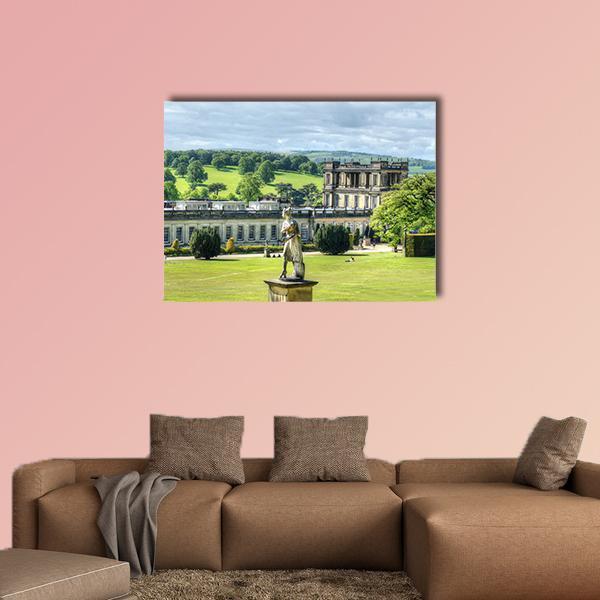 Chatsworth House with Garden Statue Canvas Wall Art in gray, green and blue, single panel hung on a wall