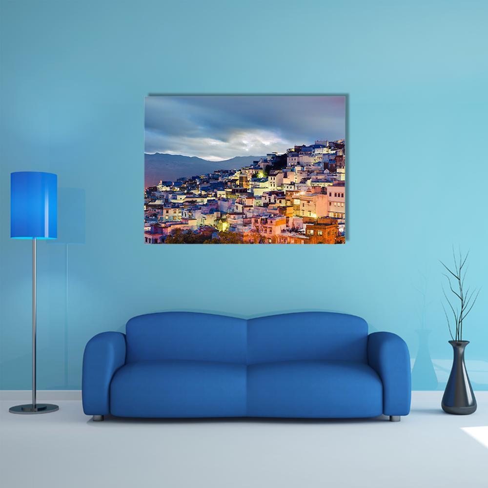 Chefchaouen Blue Town at Dusk Canvas Wall Art in blue and purple, single panel hung on a wall