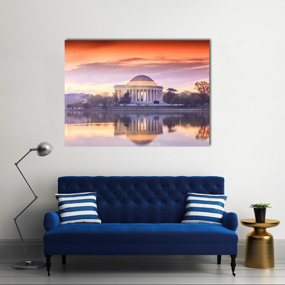 Jefferson Memorial Sunset Reflection Canvas Wall Art in orange, purple and pink, single panel hung on a wall