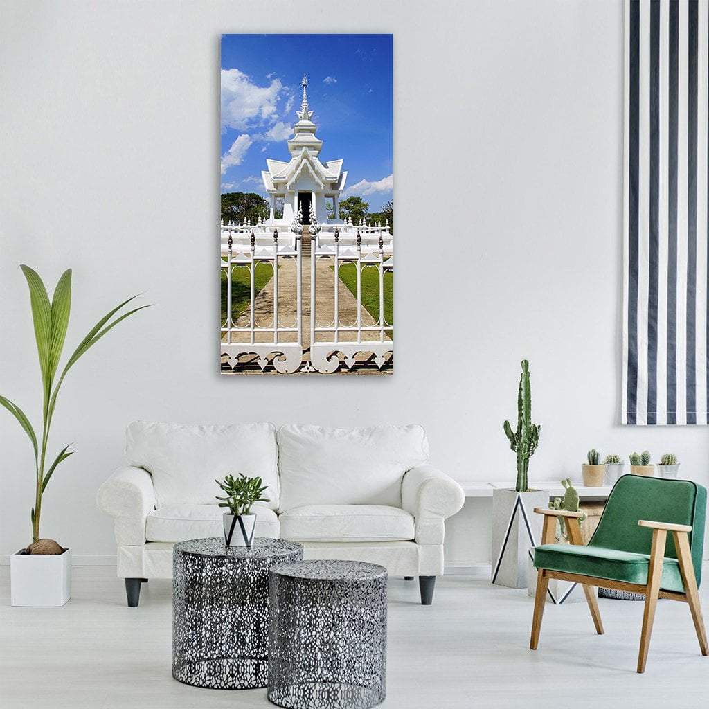 Ornate White Thai Temple Gate Vertical Canvas Wall Art in white and blue, single vertical panel hung on a wall