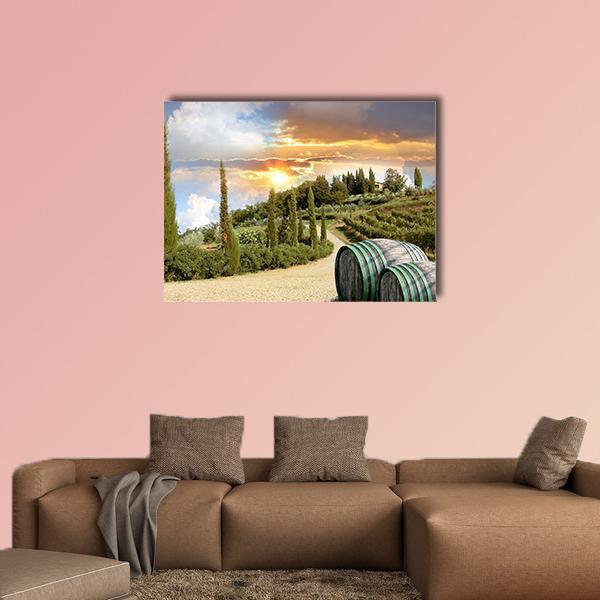 Chianti Vineyard at Sunset Canvas Wall Art in orange, yellow and green, single panel hung on a wall