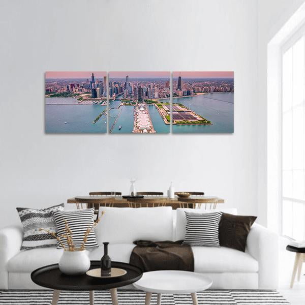 Chicago Skyline with Willis Tower Panoramic Canvas Wall Art in gray, blue and pink, hung on a wall