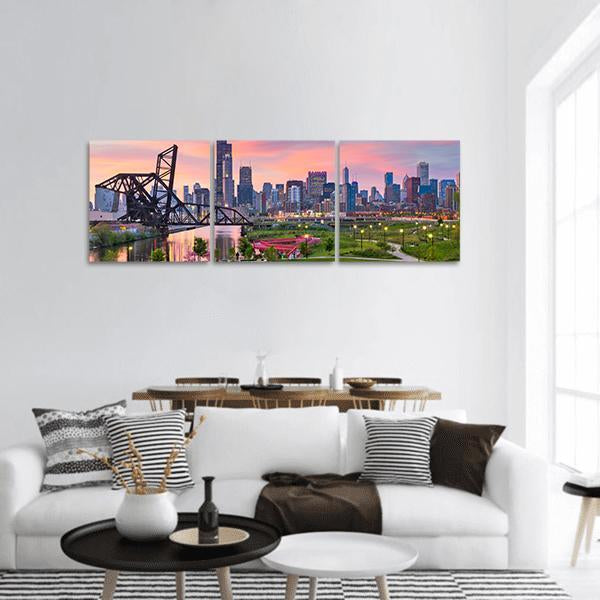 Chicago Skyline at Twilight Panoramic Canvas Wall Art in orange, blue and pink, hung on a wall