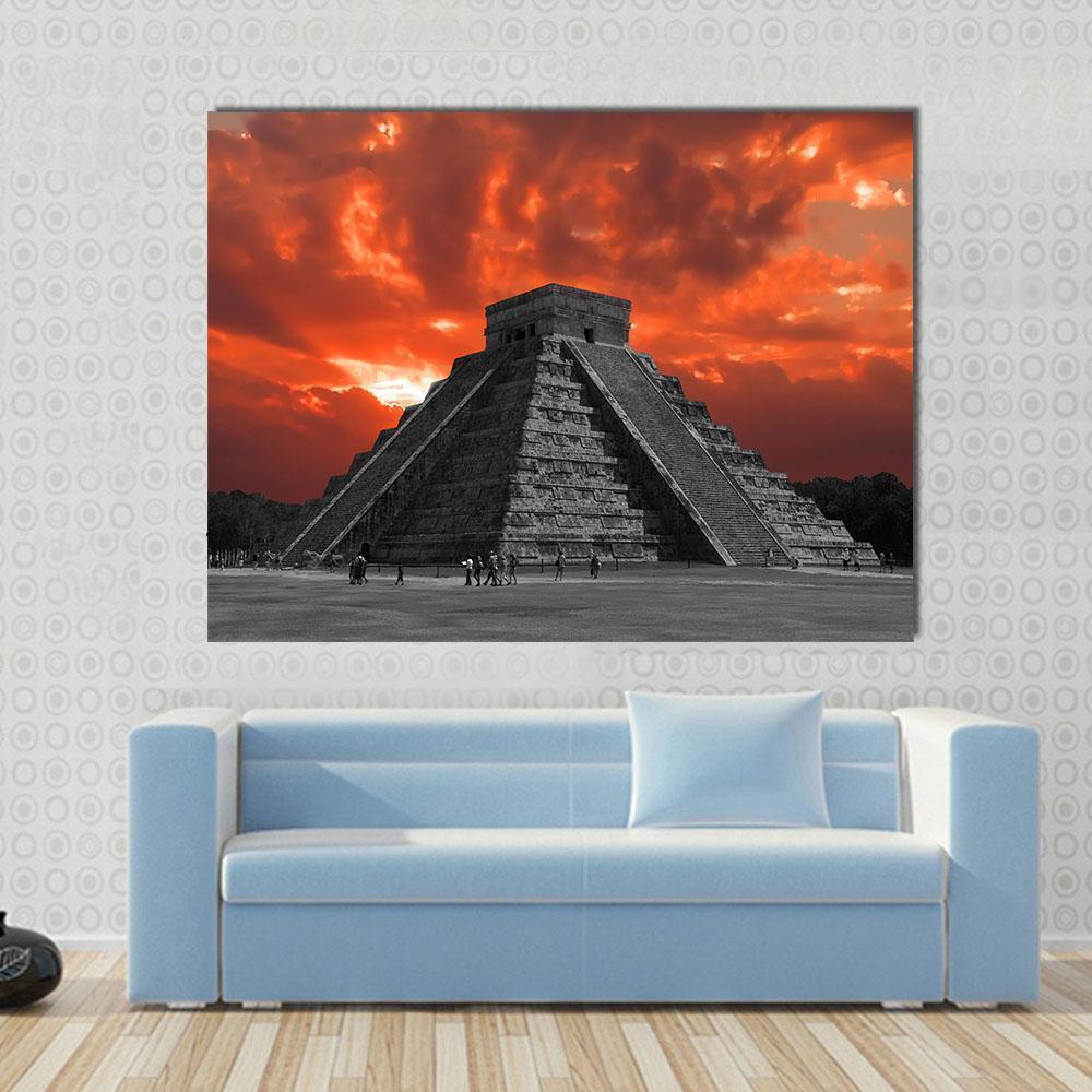 Chichen Itza Temple at Sunset Canvas Wall Art in black, gray and orange, single panel hung on a wall