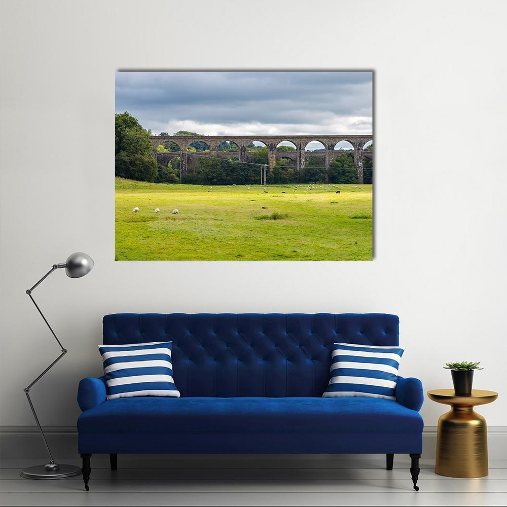 Chirk Aqueduct &amp; Viaduct Canvas Wall Art in gray, green and blue, single panel hung on a wall