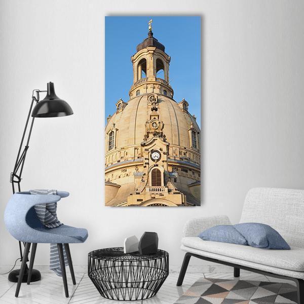 Church Dome in Dresden Vertical Canvas Wall Art in beige, brown and blue, single vertical panel hung on a wall