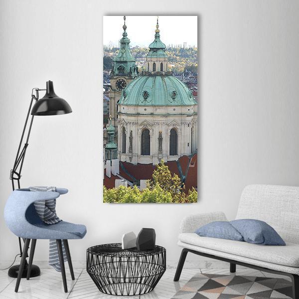 Prague Cathedral with Green Copper Domes Vertical Canvas Wall Art in white, gray and green, single vertical panel hung on a wall