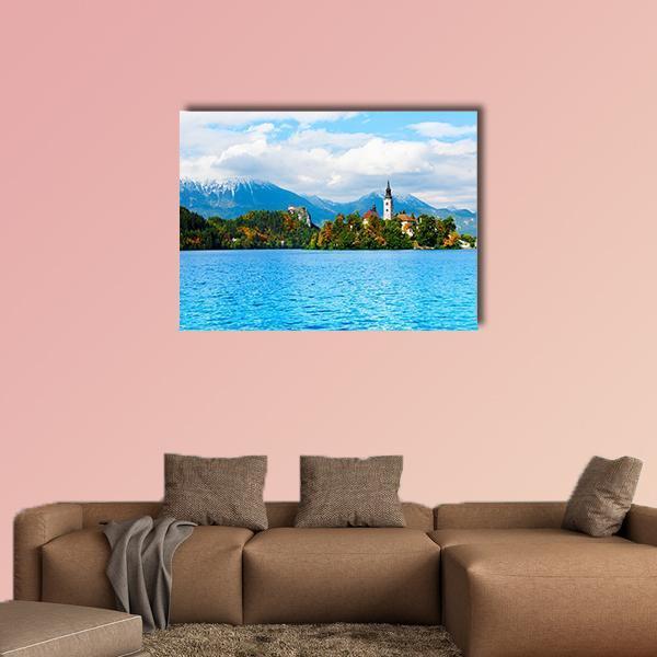 Island Church on Bled Lake Canvas Wall Art in white, green and blue, single panel hung on a wall