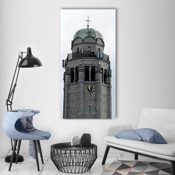 Church Tower in Opole Vertical Canvas Wall Art in white and gray, single vertical panel hung on a wall