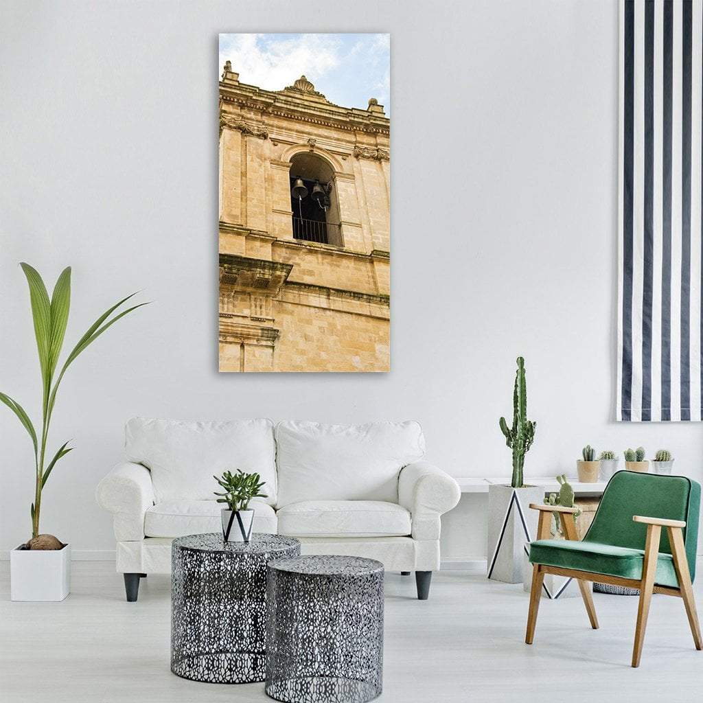 Historic Bell Tower with Two Bells Vertical Canvas Wall Art in white, beige and blue, single vertical panel hung on a wall