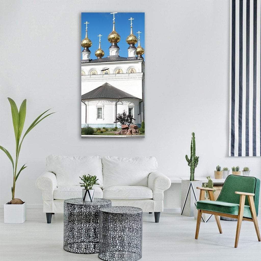 Russian Orthodox Church with Five Golden Onion Domes Vertical Canvas Wall Art in white, gold and blue, single vertical panel hung on a wall
