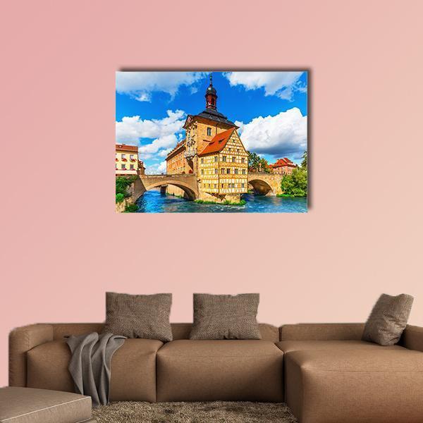 Bamberg City Hall Canvas Wall Art in brown, orange and blue, single panel hung on a wall