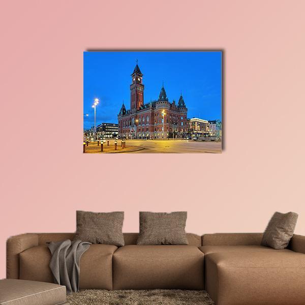 Helsingborg City Hall at Twilight Canvas Wall Art in brown, orange and blue, single panel hung on a wall