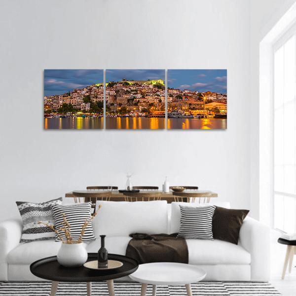 Kavala Harbor at Golden Twilight Panoramic Canvas Wall Art in gold, orange and blue, hung on a wall