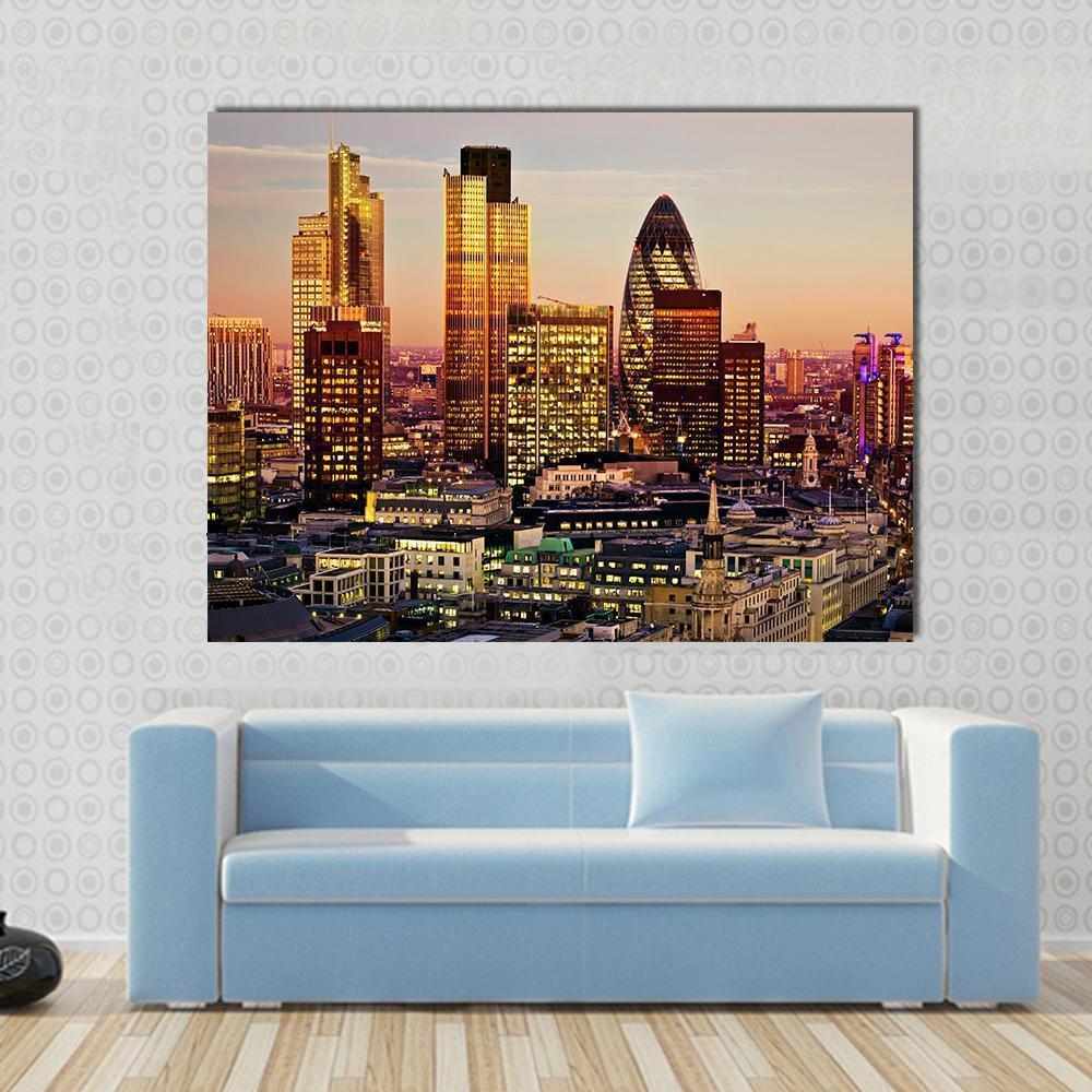 City of London Golden Hour Canvas Wall Art in gold, orange and yellow, single panel hung on a wall