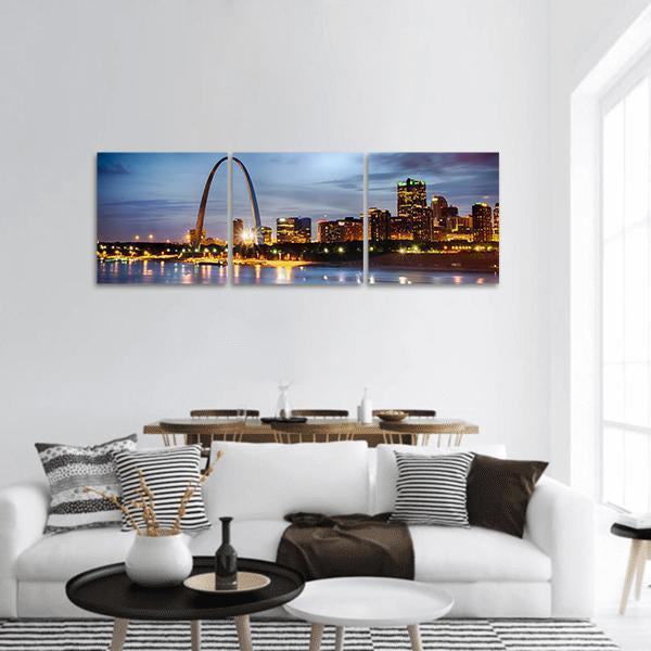 St Louis Skyline Panoramic Canvas Wall Art in black, yellow and blue, hung on a wall