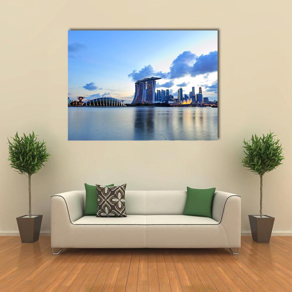 Marina Bay Skyline at Dusk Canvas Wall Art in white and blue, single panel hung on a wall