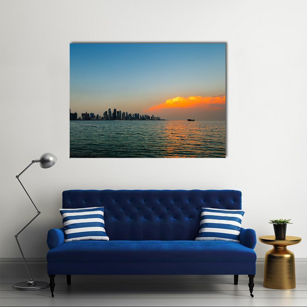 Qatar City Skyline at Sunset Canvas Wall Art in orange and blue, single panel hung on a wall