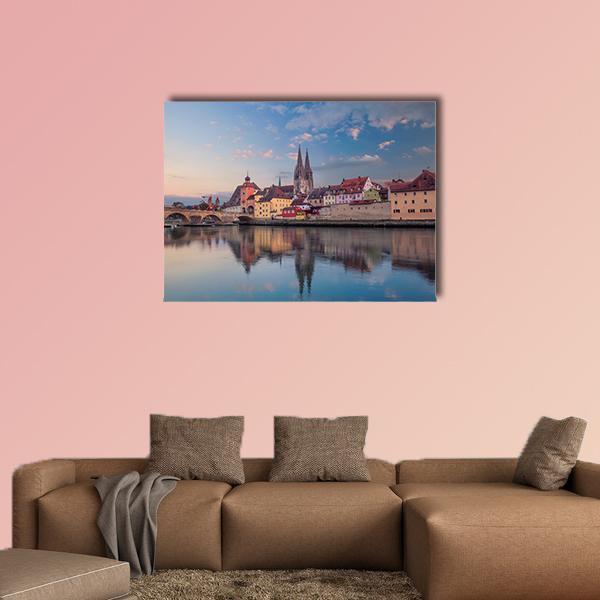 Regensburg Cityscape Canvas Wall Art in brown, orange and blue, single panel hung on a wall