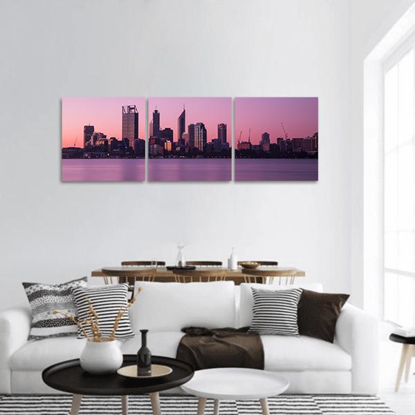 Perth Waterfront Skyline at Dusk Panoramic Canvas Wall Art in purple and pink, hung on a wall