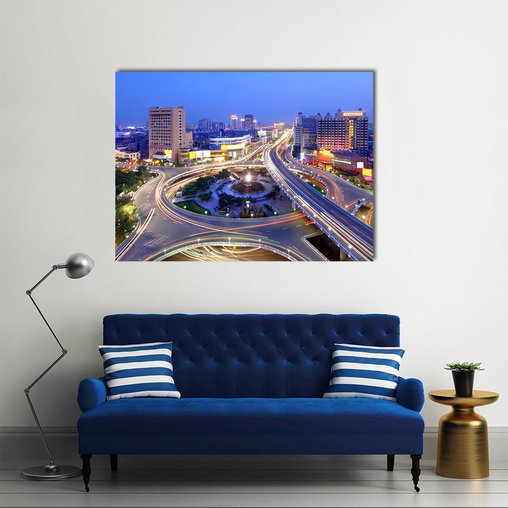 Nanchang Cityscape at Night Canvas Wall Art in gold, yellow and blue, single panel hung on a wall