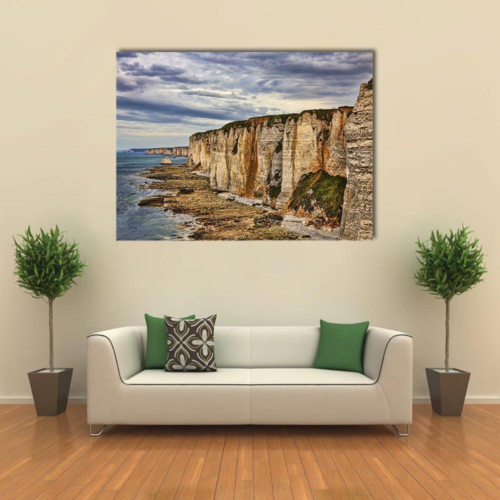 Sheer Cliffs of Etretat Canvas Wall Art in gray, beige and blue, single panel hung on a wall