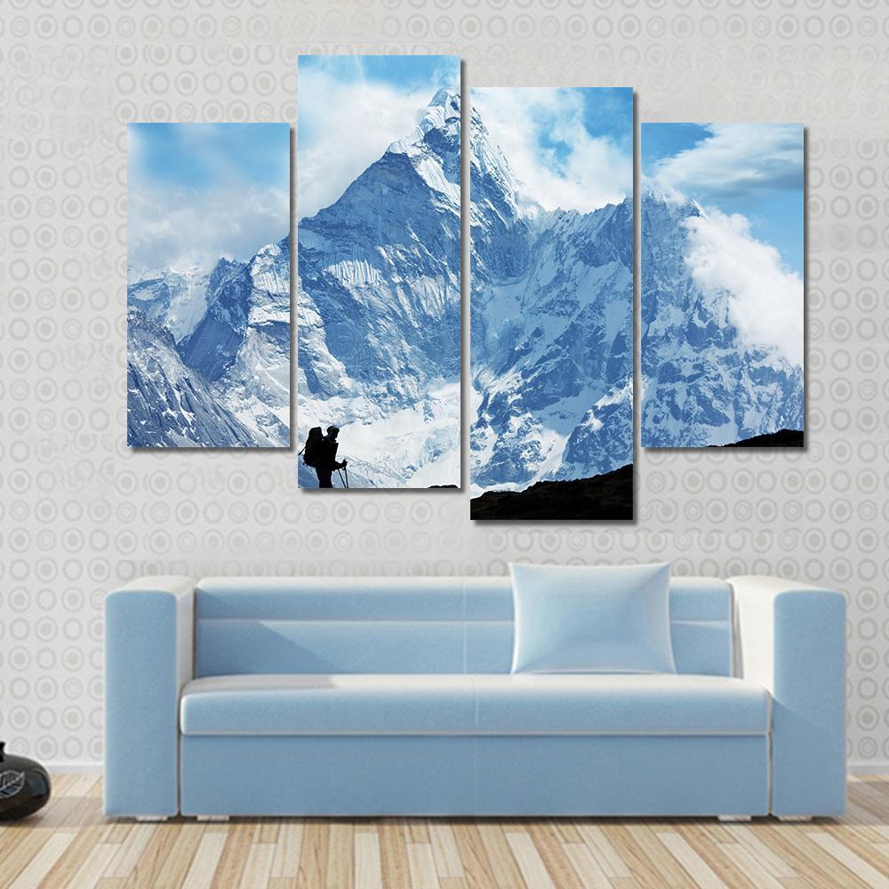Climber on Himalaya Canvas Wall Art in black, white and blue, 4 panel Pop layout hung on a wall