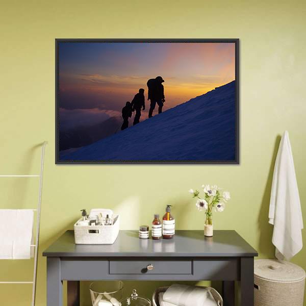 Climbers on Everest at Dusk Canvas Wall Art in black, orange and blue, framed canvas, product view on a white background