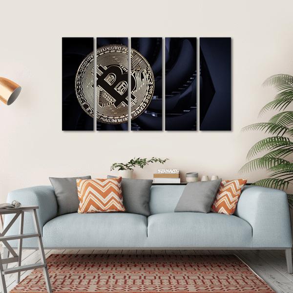 Close-up Bitcoin Coin Canvas Wall Art in black and gold, hung on a wall