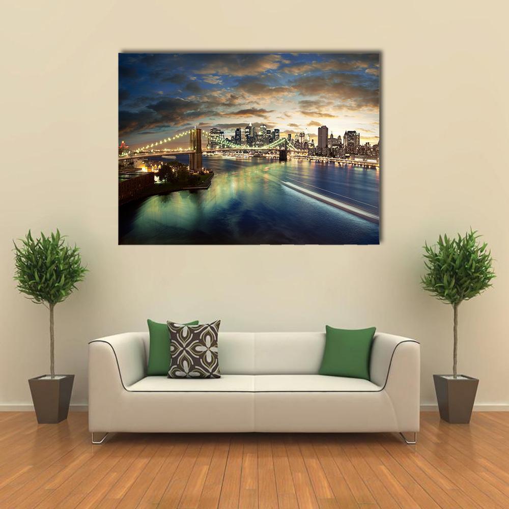 Clouds Over Brooklyn Bridge Canvas Wall Art in black, yellow and blue, single panel hung on a wall