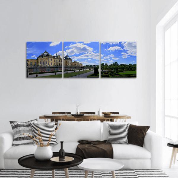 Drottningholm Castle and Formal Gardens Panoramic Canvas Wall Art in white, green and blue, hung on a wall