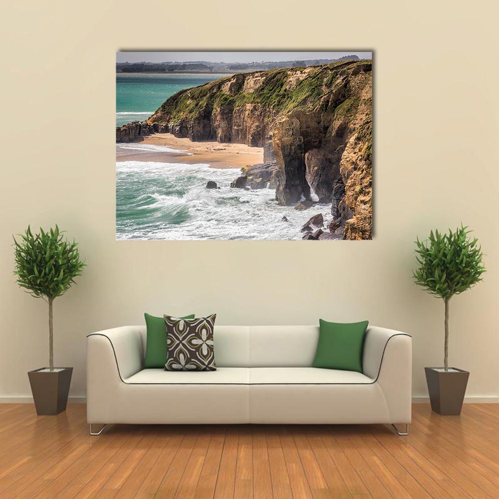 New Zealand Coastal Cliffs Canvas Wall Art in brown, green and blue, single panel hung on a wall