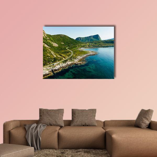 Winding Coastal Road at Vestvagoy Canvas Wall Art in green and blue, single panel hung on a wall