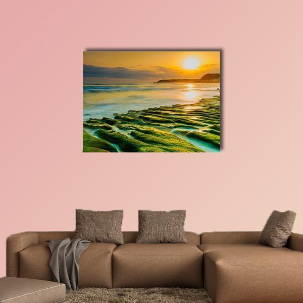 Laomei Coast Stone Trench at Sunset Canvas Wall Art in yellow, green and blue, single panel hung on a wall