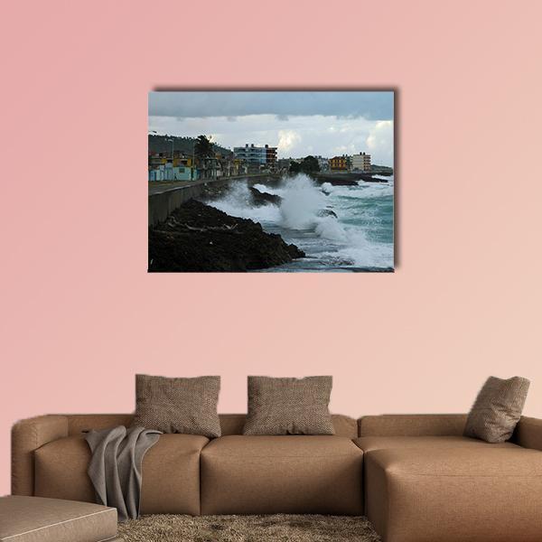 Coastal Town with Crashing Waves Canvas Wall Art in white, gray and blue, single panel hung on a wall