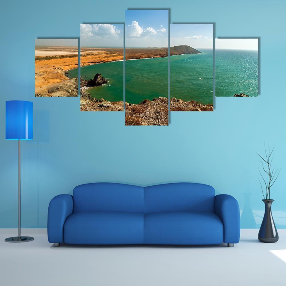 Coastline in La Guajira Canvas Wall Art in brown, orange and blue, 5 panel Star layout hung on a wall
