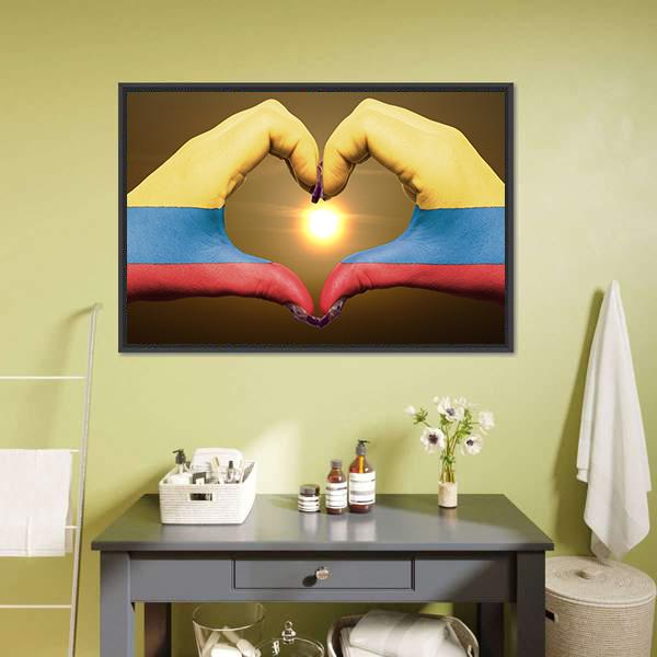 Hands Forming Heart with Colombian Flag Canvas Wall Art in red, yellow and blue, framed canvas, product view on a white background