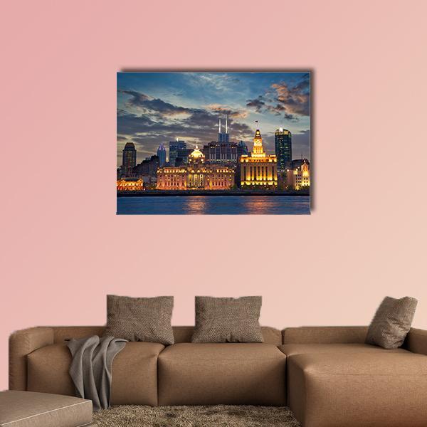 The Bund in Shanghai Canvas Wall Art in gold, yellow and blue, single panel hung on a wall