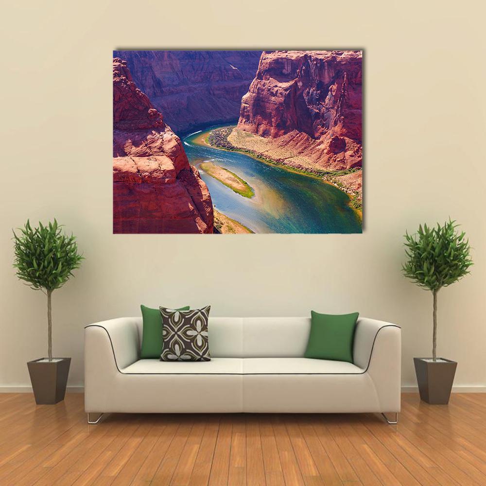 Colorado River Landscape Canvas Wall Art in brown, red and blue, single panel hung on a wall