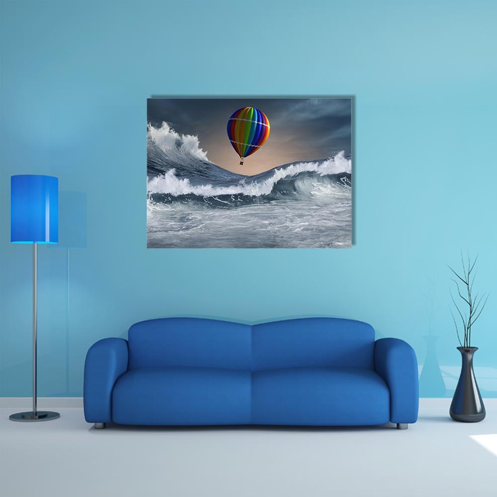 Rainbow Hot Air Balloon Over Stormy Sea Canvas Wall Art in white, gray and blue, single panel hung on a wall