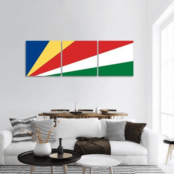 Seychelles Flag with Oblique Color Bands Panoramic Canvas Wall Art in red, yellow and blue, hung on a wall