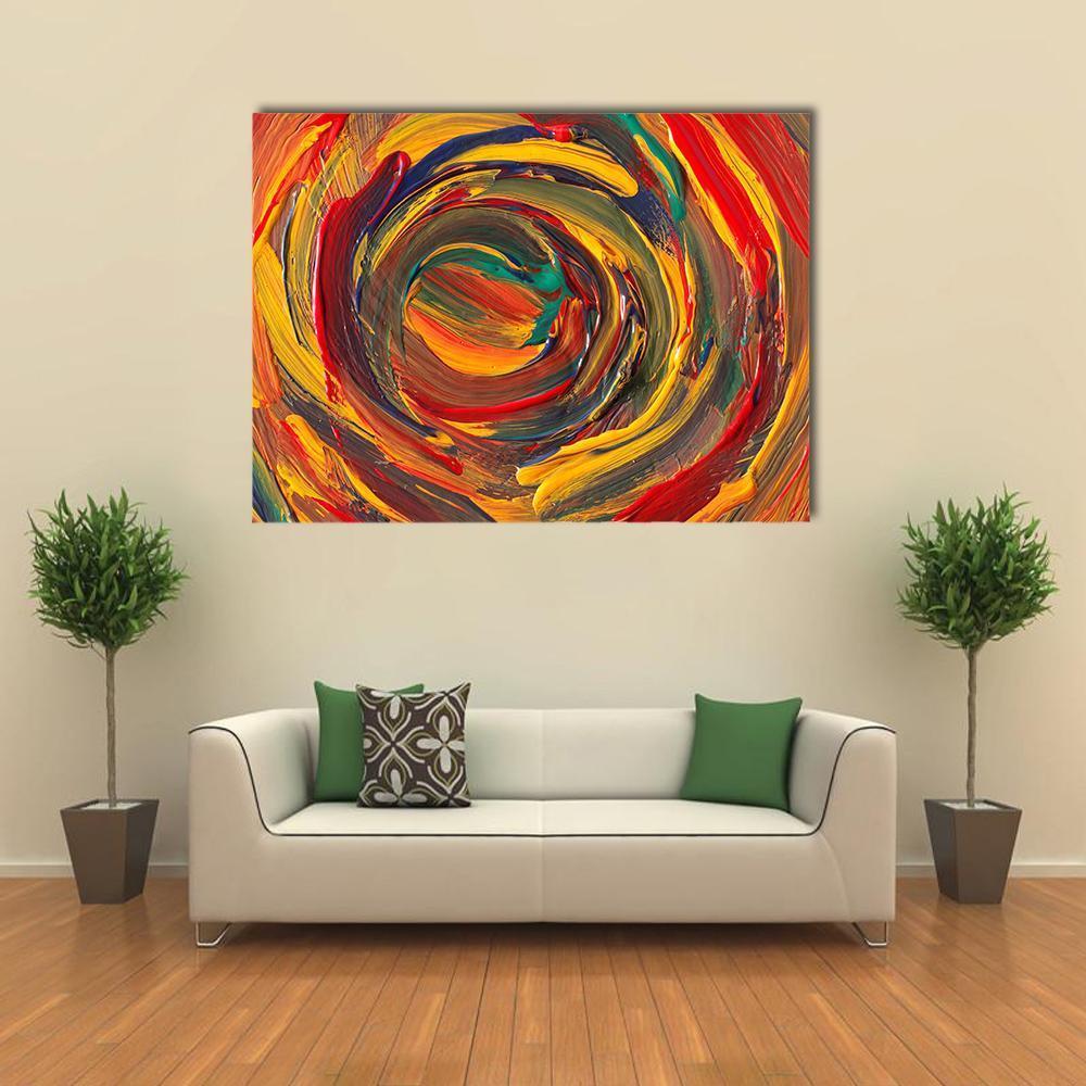 Vibrant Abstract Swirl with Impasto Texture Canvas Wall Art in red, yellow and multicolor, single panel hung on a wall