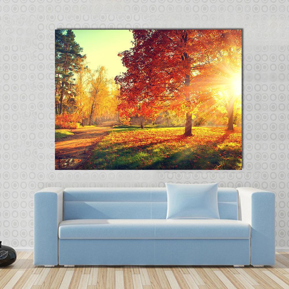Colorful Autumn Morning Canvas Wall Art in red, orange and yellow, single panel hung on a wall